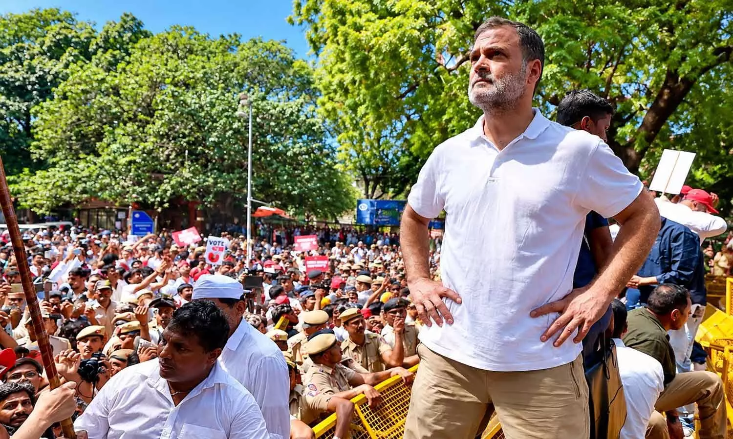 Rahul Gandhi standing atop police barricades in New Delhi Rahul Gandhi standing atop police barricades in New Delhi