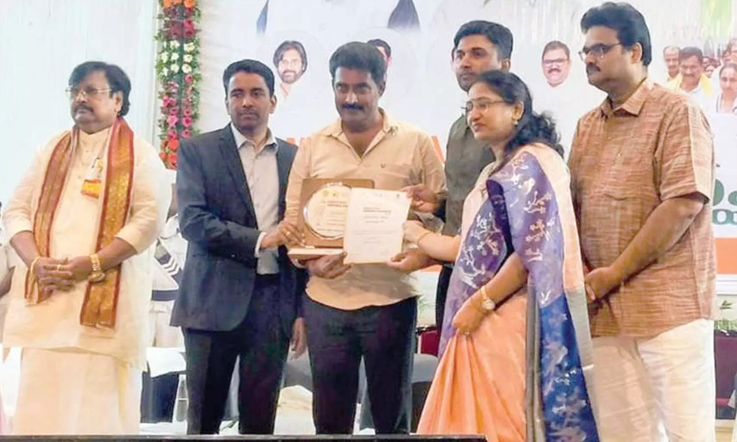 NTR district collector Dr G Lakshmisha, along with VMC Commissioner HM Dhyanachandra, DEO L Chandrakala and others, presenting the district-level Swachh Andhra Award (SASA)-2026 to PM SHRI Zilla Parishad High School, Nunna, Headmaster Surapaneni Ravi Prasad in Vijayawada NTR district collector Dr G Lakshmisha, along with VMC Commissioner HM Dhyanachandra, DEO L Chandrakala and others, presenting the district-level Swachh Andhra Award (SASA)-2026 to PM SHRI Zilla Parishad High School, Nunna, Headmaster Surapaneni Ravi Prasad in Vijayawada