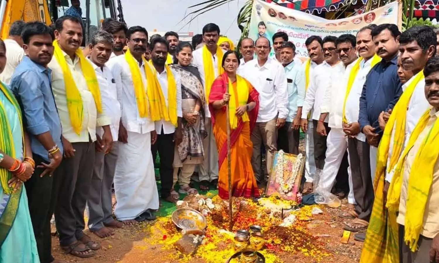 Raptadu MLA Paritala Sunitha performing the Bhoomi Puja for the CC road construction and developmental works in Gangulukunta village, accompanied by local leaders and villagers Raptadu MLA Paritala Sunitha performing the Bhoomi Puja for the CC road construction and developmental works in Gangulukunta village, accompanied by local leaders and villagers