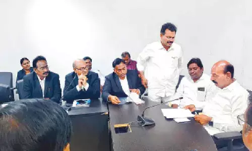 Advocates with Minister for Law and Justice NMD Farooq in Amaravati on Wednesday Advocates with Minister for Law and Justice NMD Farooq in Amaravati on Wednesday