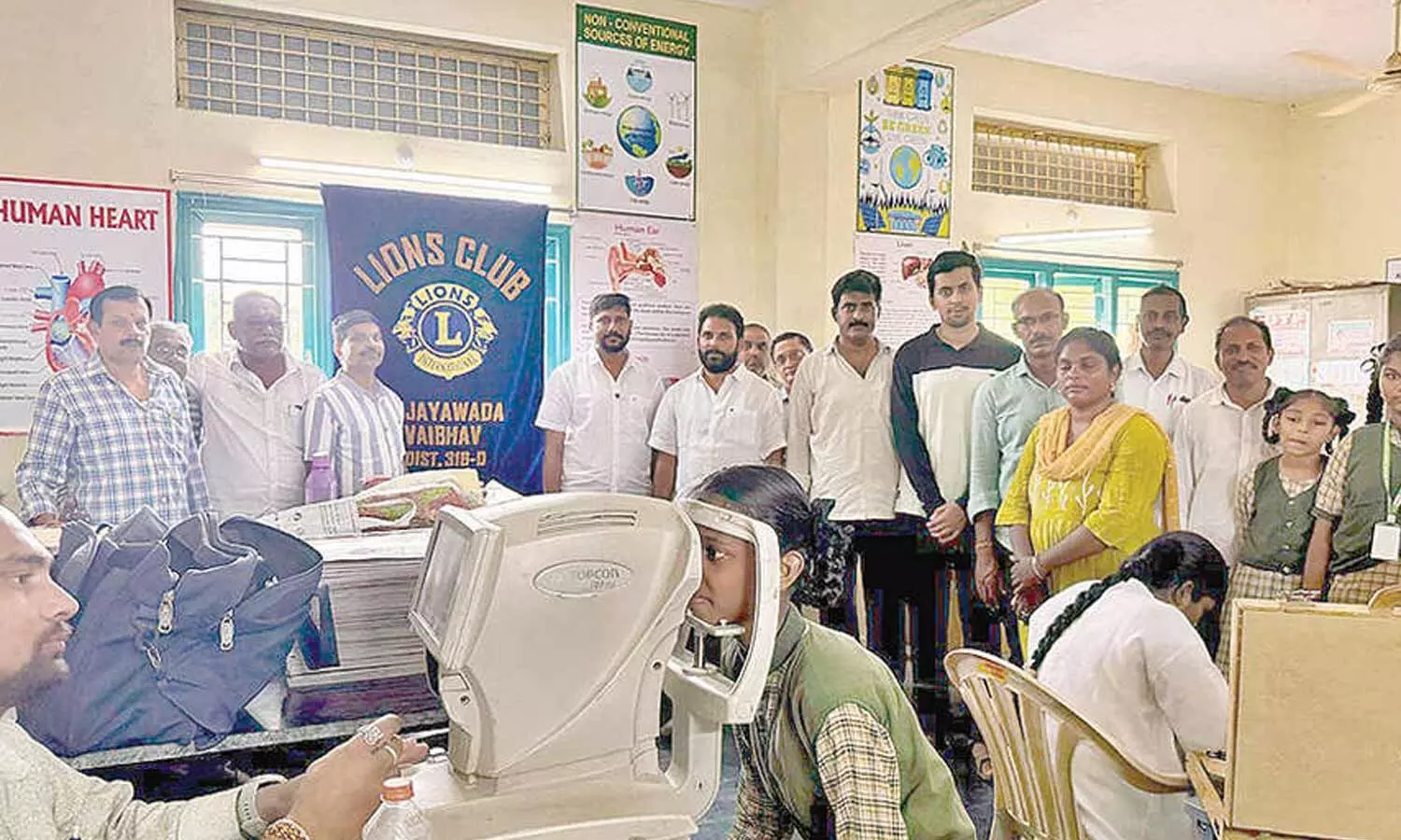 Members of the Lions Club of Vijayawada Vaibhav, Nunna ZP High School staff and School Management Committee members supervising the eye screening camp at the school in Nunna on Friday Members of the Lions Club of Vijayawada Vaibhav, Nunna ZP High School staff and School Management Committee members supervising the eye screening camp at the school in Nunna on Friday