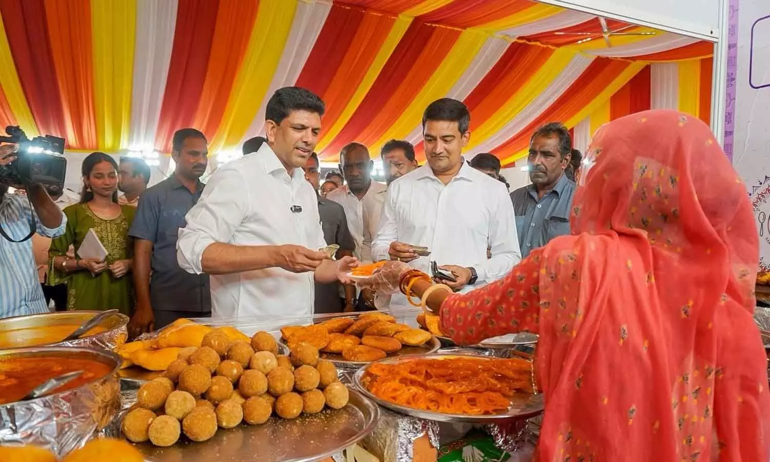Rural poverty alleviation minister Kondapalli Srinivas along with Union minister of state for rural development and communications Pemmasani Chandra Sekhar inspects the arrangements for the National Saras inauguration by President Droupadi Murmu in Vijayawada on Thursday Rural poverty alleviation minister Kondapalli Srinivas along with Union minister of state for rural development and communications Pemmasani Chandra Sekhar inspects the arrangements for the National Saras inauguration by President Droupadi Murmu in Vijayawada on Thursday