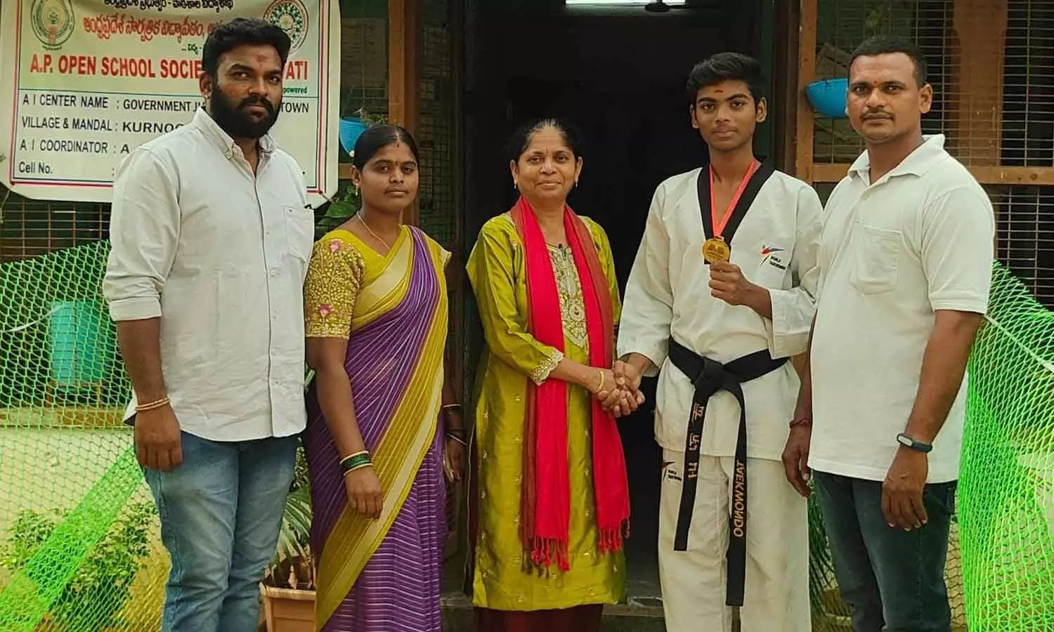 Student of Government Junior College (Town), Kurnool principal Uppuluru Padmavathi congratulating Karthik on Thursday Student of Government Junior College (Town), Kurnool principal Uppuluru Padmavathi congratulating Karthik on Thursday