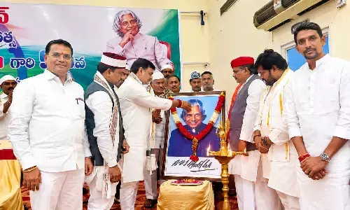 BJP state president PVN Madhav and other leaders paying floral tributes to former President Dr APJ Abdul Kalam during his 95th birth anniversary celebrations at HO Convention in Bhavanipuram, Vijayawada, on Thursday