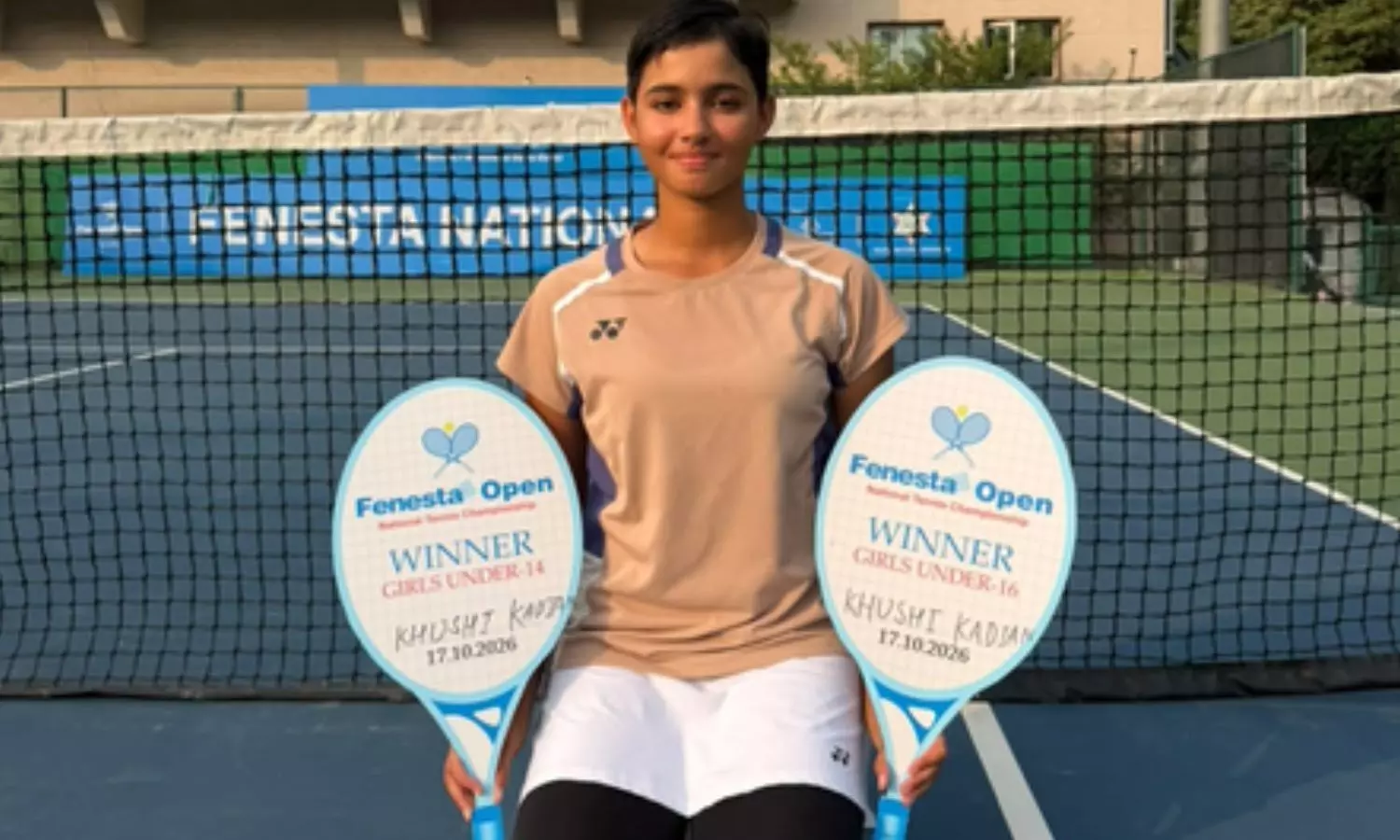 A day after winning the U-16 doubles title A day after winning the U-16 doubles title