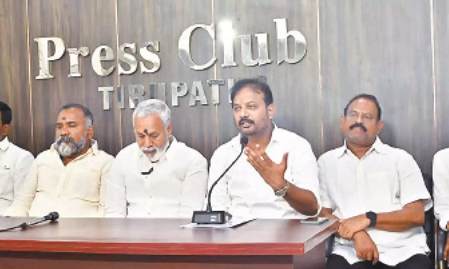 Chandragiri MLA Pulivarty Nani, Puthalapattu MLA K Murali Mohan, and TUDA Chairman C Divakar Reddy addressing a press conference at the Tirupati Press Club on Saturday regarding the Punganur nomination violence Chandragiri MLA Pulivarty Nani, Puthalapattu MLA K Murali Mohan, and TUDA Chairman C Divakar Reddy addressing a press conference at the Tirupati Press Club on Saturday regarding the Punganur nomination violence