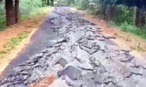 The damaged road in Pullampeta mandal The damaged road in Pullampeta mandal