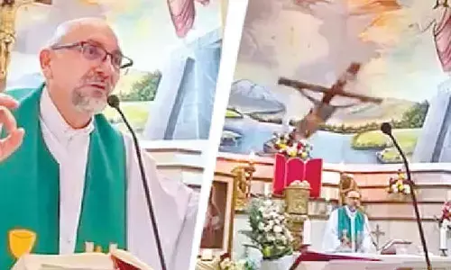 Priest speaks of death in sermon, dies as cross falls on him Priest speaks of death in sermon, dies as cross falls on him