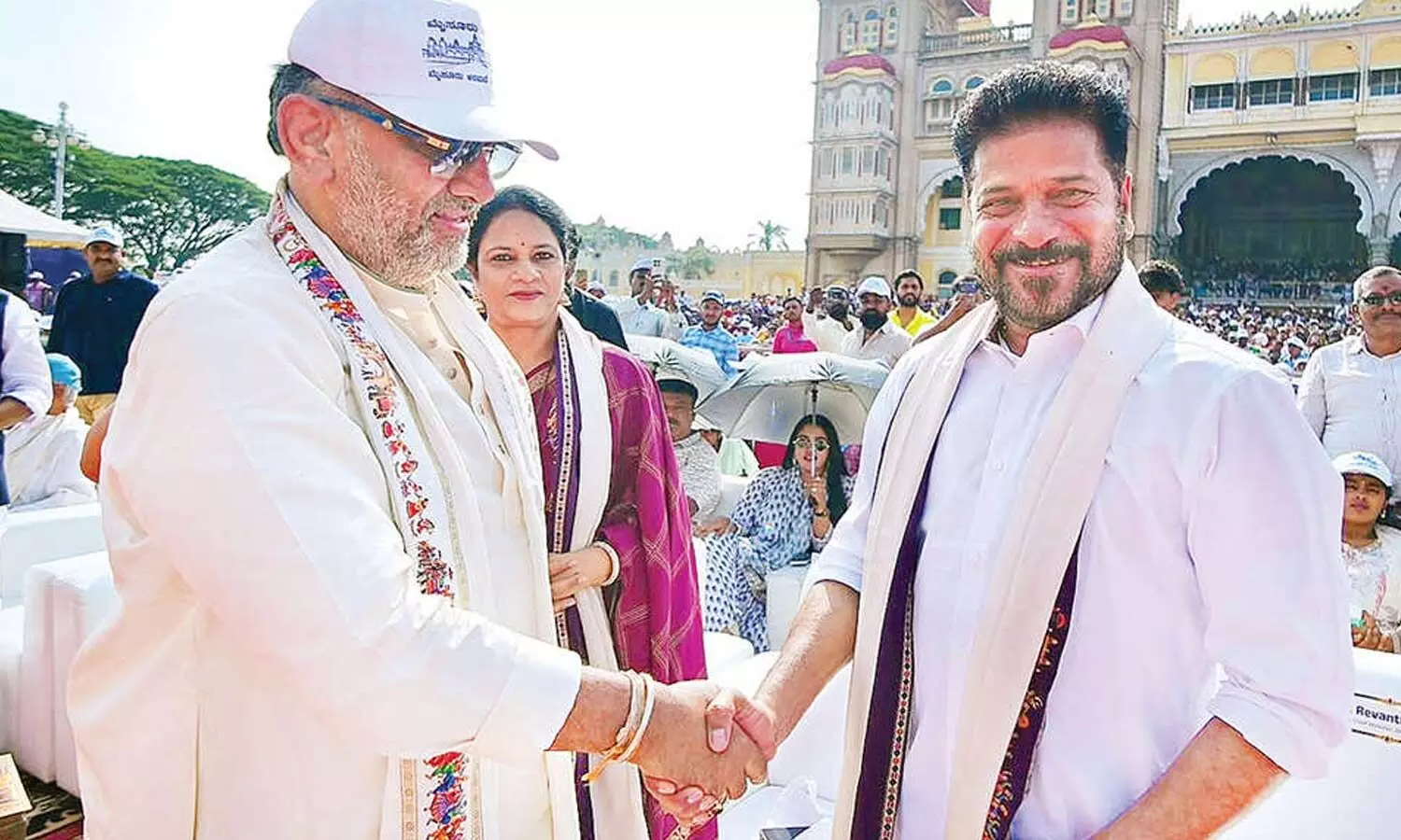 Karnataka Chief Minister DK Shivakumar greets Telangana Chief Minister A Revanth Reddy during the festive Mysuru Dasara celebrations Karnataka Chief Minister DK Shivakumar greets Telangana Chief Minister A Revanth Reddy during the festive Mysuru Dasara celebrations