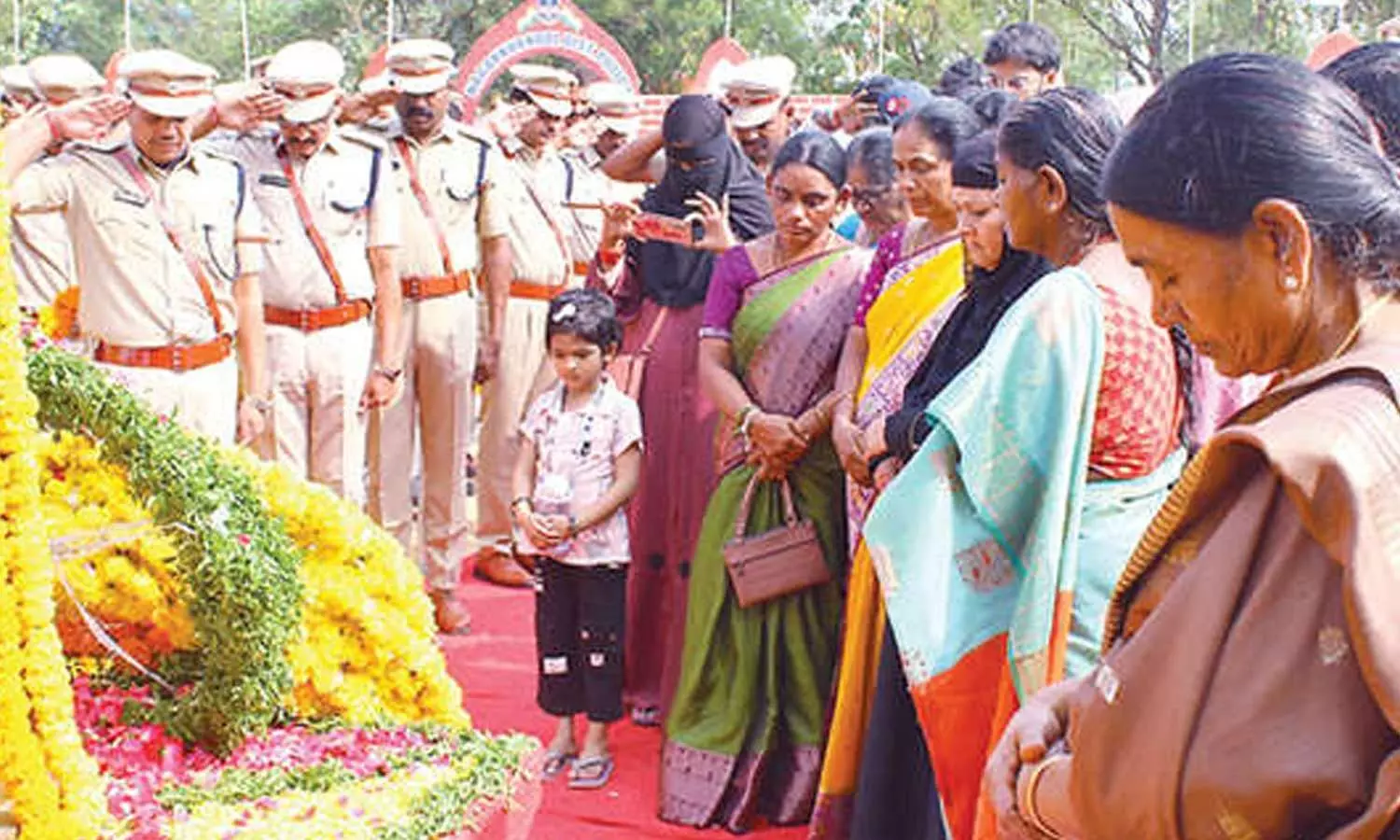 Family members of police martyrs paying tributes at the martyrs’ memorial Family members of police martyrs paying tributes at the martyrs’ memorial