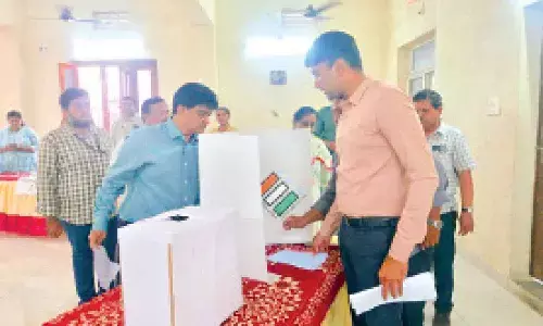 VMC Commissioner HM Dhyanachandra inspecting the model polling station set up at Varalakshmi Nagar in Vijayawada on Wednesday VMC Commissioner HM Dhyanachandra inspecting the model polling station set up at Varalakshmi Nagar in Vijayawada on Wednesday