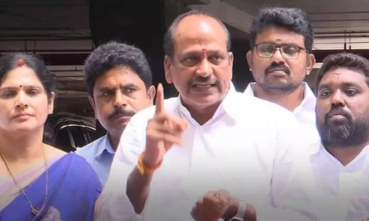 YSRCP MLC Lella Appi Reddy along with other party leaders speaks to the media at SEC office in Vijayawada on Thursday YSRCP MLC Lella Appi Reddy along with other party leaders speaks to the media at SEC office in Vijayawada on Thursday
