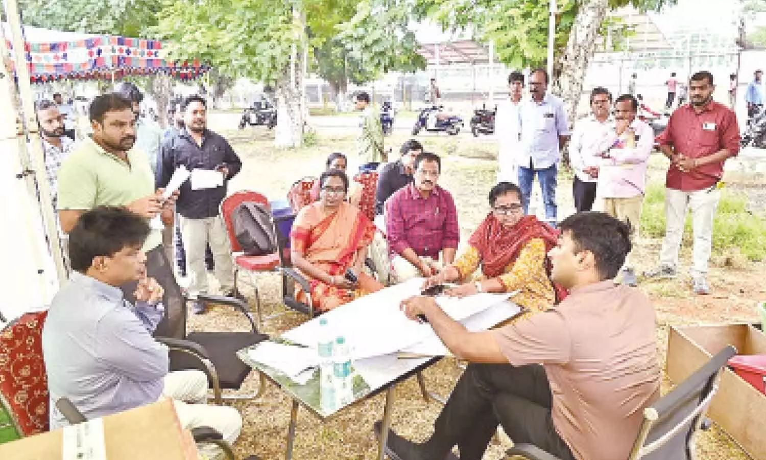 VMC Commissioner Dhyanachandra discussing election arrangements with Returning Officer Rajani Kumari and others at Andhra Loyola College in Vijayawada on Saturday VMC Commissioner Dhyanachandra discussing election arrangements with Returning Officer Rajani Kumari and others at Andhra Loyola College in Vijayawada on Saturday