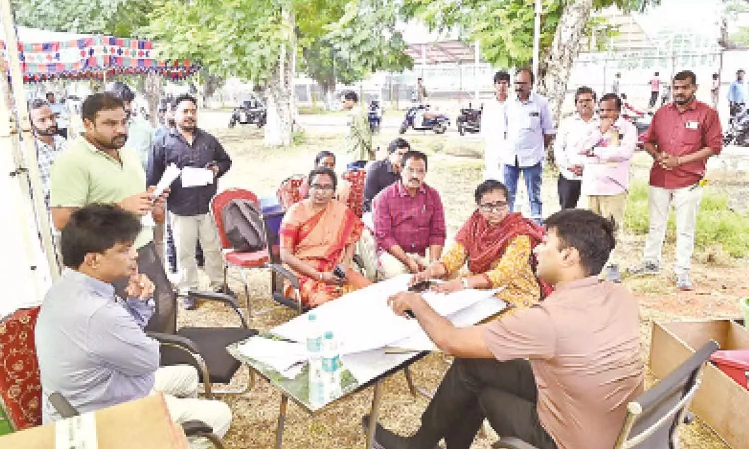 VMC Commissioner Dhyanachandra discussing election arrangements with Returning Officer Rajani Kumari and others at Andhra Loyola College in Vijayawada on Saturday VMC Commissioner Dhyanachandra discussing election arrangements with Returning Officer Rajani Kumari and others at Andhra Loyola College in Vijayawada on Saturday