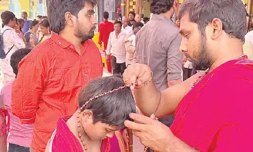 Bhavani devotees and general pilgrims thronging the Sri Kanaka Durga Temple atop Indrakeeladri in Vijayawada on Sunday