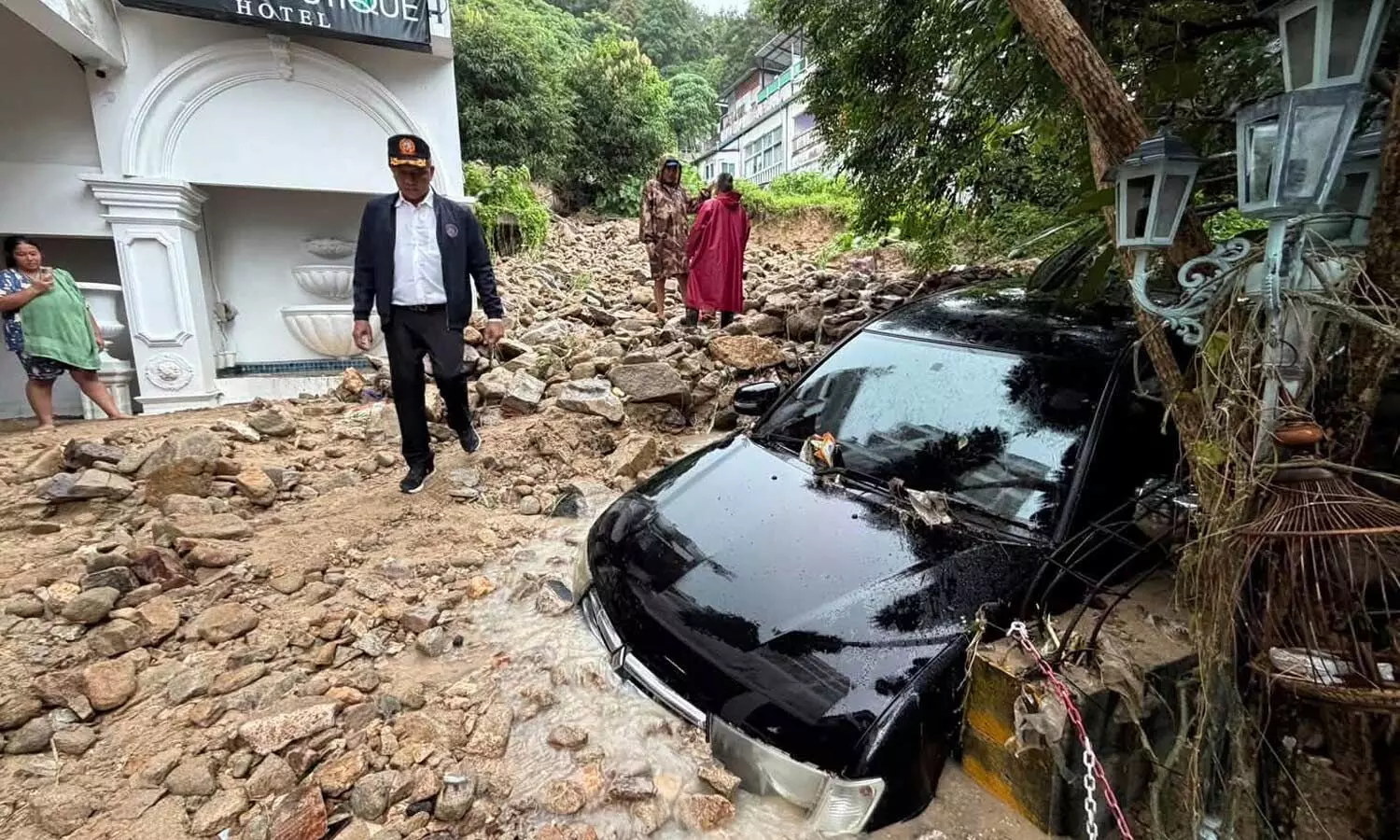 Flash floods inundate several areas of Thailands Phuket island after heavy rain Flash floods inundate several areas of Thailands Phuket island after heavy rain