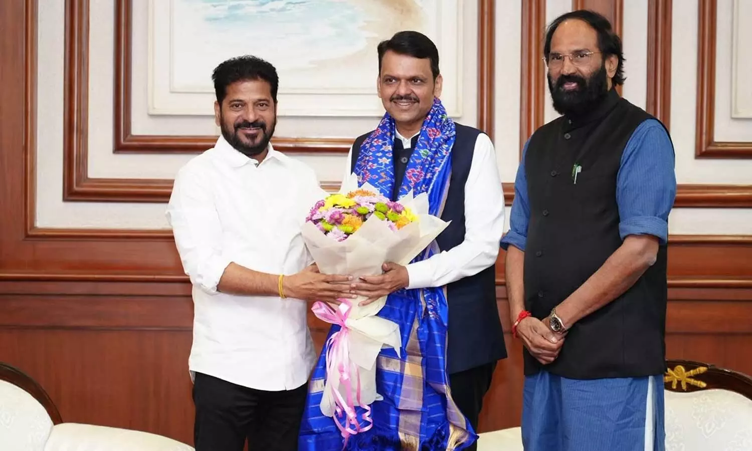 Chief Minister A Revanth Reddy greets Maharashtra CM Devendra Fadnavis in Mumbai on Monday. TG Irrigation Minister Uttam Kumar Reddy is also seen Chief Minister A Revanth Reddy greets Maharashtra CM Devendra Fadnavis in Mumbai on Monday. TG Irrigation Minister Uttam Kumar Reddy is also seen