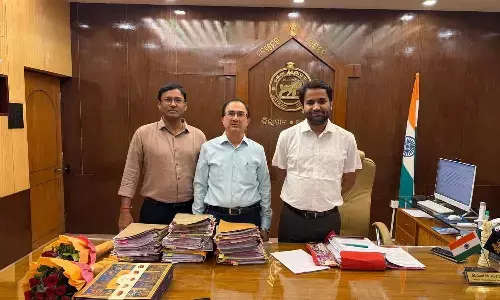 TGGENCO CMD S. Harish with Angul District Collector Abdaal M Akhtar during a meeting in Odisha on Monday to secure extended transportation timings for coal dispatch from the Naini coal block to the Yadadri Thermal Power Station.