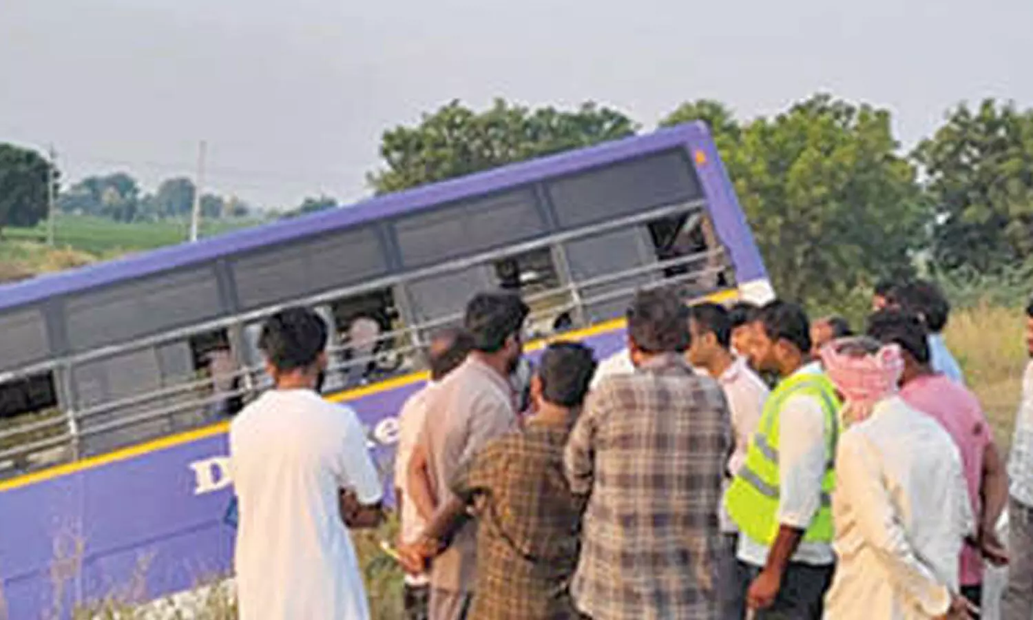 Two injured after RTC bus veers off highway Two injured after RTC bus veers off highway