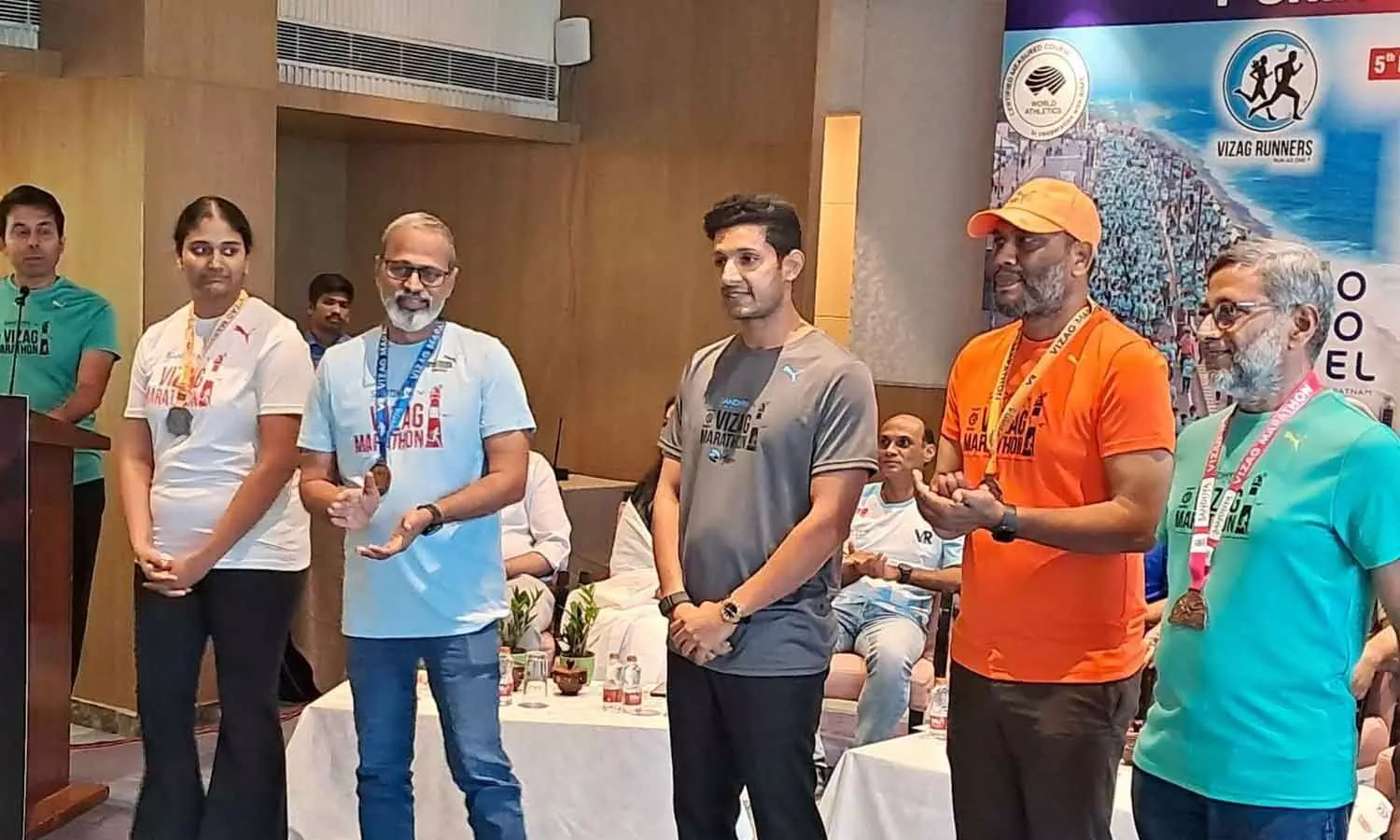 Marathon medals being launched at the event organised in Visakhapatnam on Thursday Marathon medals being launched at the event organised in Visakhapatnam on Thursday