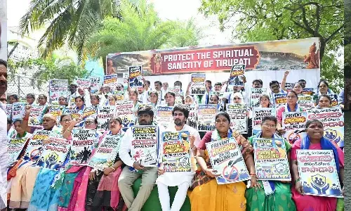 YSRCP district president Bhumana Abhinay Reddy and party leaders staging a protest in Tirupati on Thursday