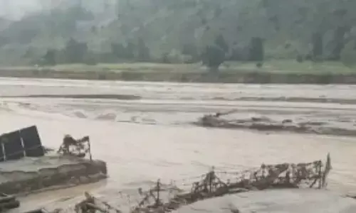 A glacial lake outburst flood (GLOF) A glacial lake outburst flood (GLOF)