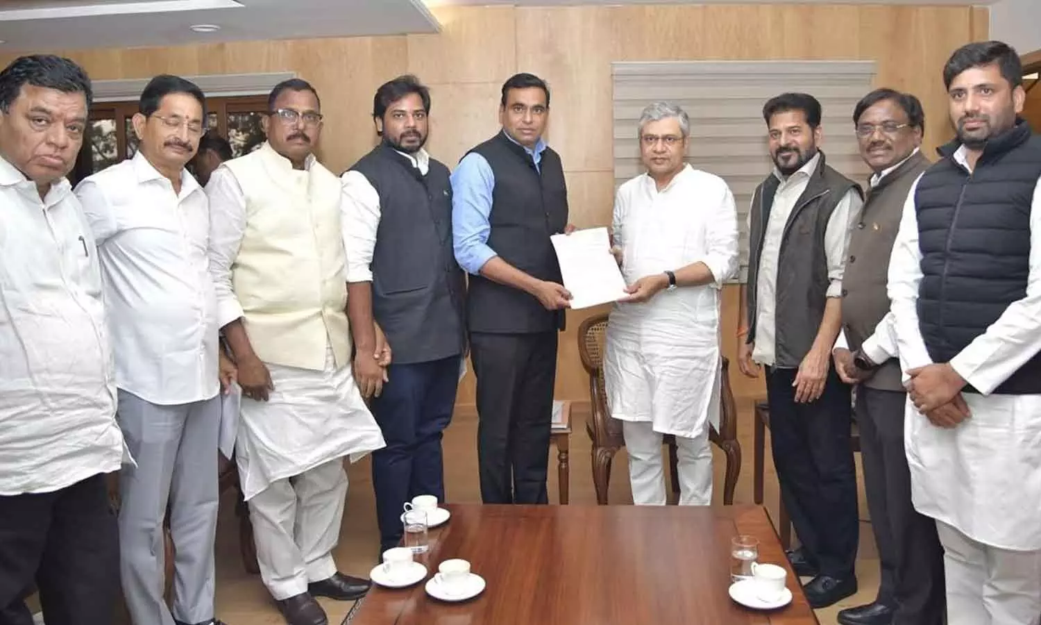 Chief Minister A Revanth Reddy (third from right) along with a delegation of Telangana Congress leaders, meets Union Minister for Railways Ashwini Vaishnaw (fourth from right) at Rail Bhavan in New Delhi Chief Minister A Revanth Reddy (third from right) along with a delegation of Telangana Congress leaders, meets Union Minister for Railways Ashwini Vaishnaw (fourth from right) at Rail Bhavan in New Delhi