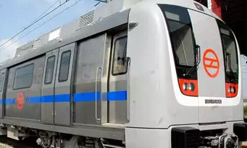 Woman jumps on tracks to retrieve money; rescued