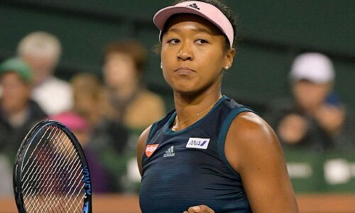 Osaka keeps title defense on track