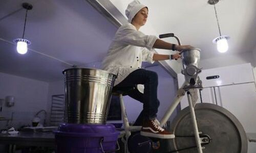 In Ivory Coast, organic chocolate made with a bicycle