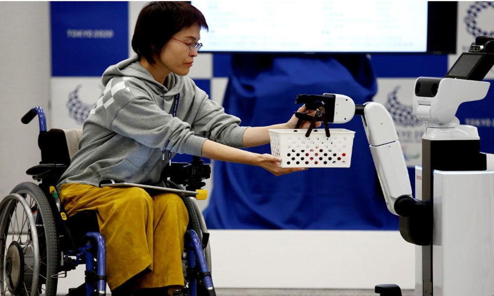 Olympics: Tokyo 2020 unveils robots to help wheelchair users, workers
