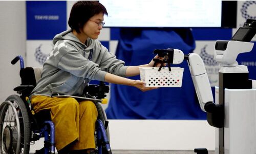 Olympics: Tokyo 2020 unveils robots to help wheelchair users, workers