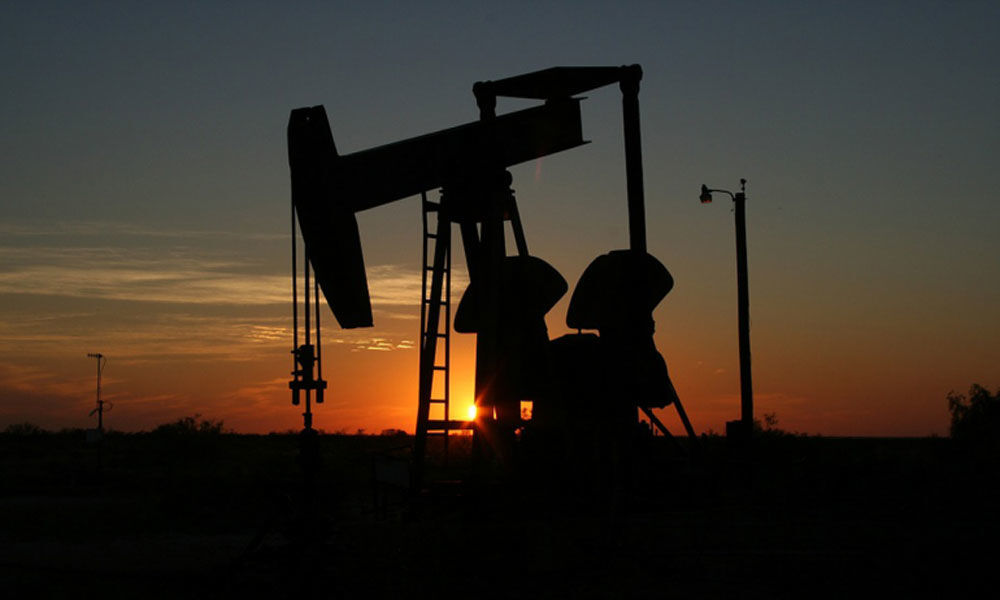 Oil slips on economic slowdown, but OPEC-led cuts still support