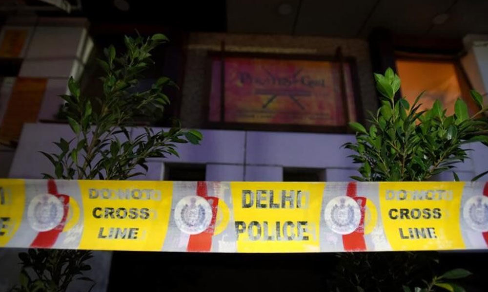 Two senior restaurant managers arrested