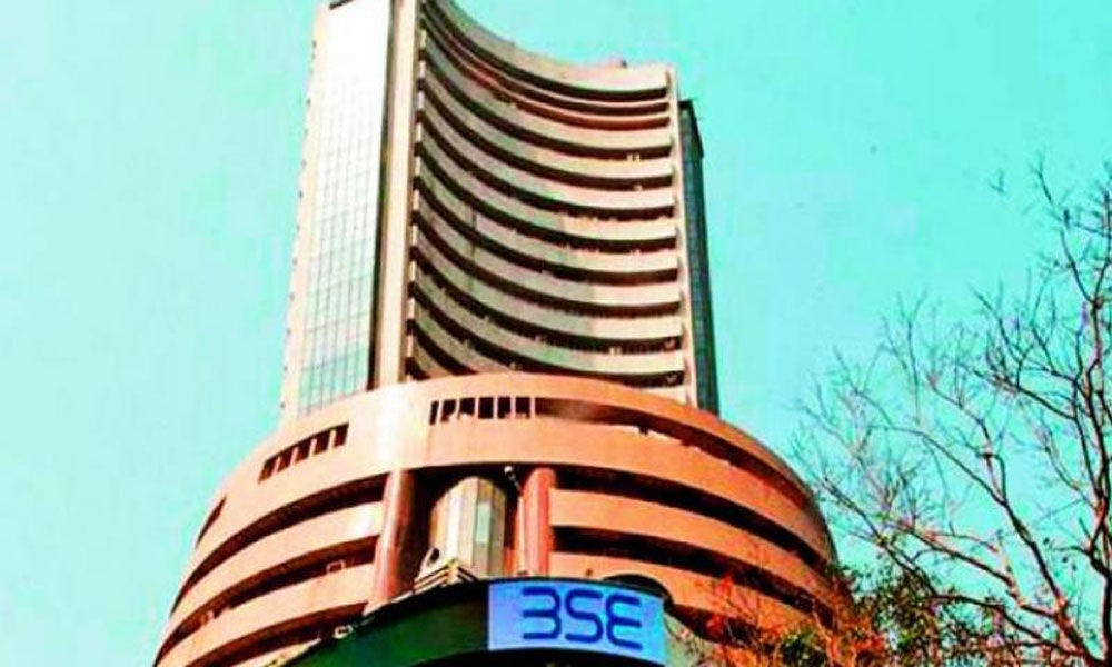 Sensex sinks 355 points tracking global sell-off