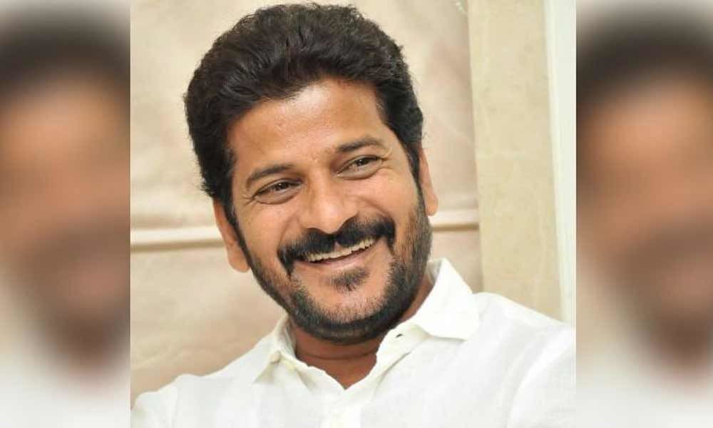 Revanth Reddy pays pending challans of Rs 5,000 for traffic violation