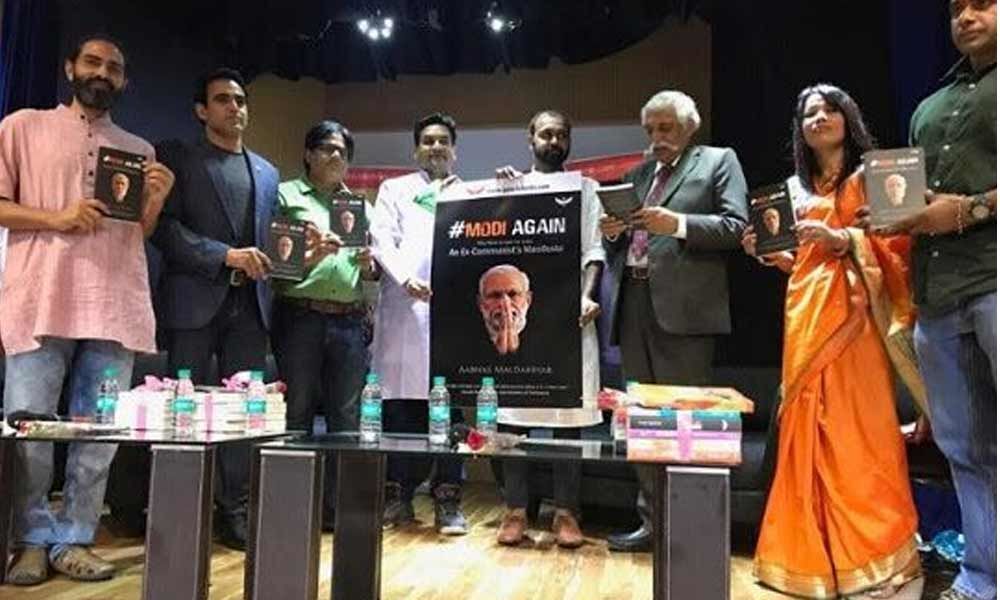 Two new books Modi Again, Saffron Swords hit stands