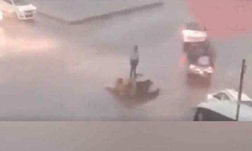 Watch: Assam traffic cop carry out duty in heavy downpour, becomes social media star