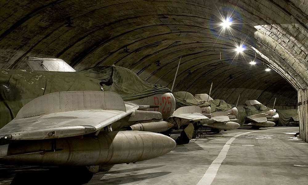 In hidden mountain air base, Alabnia stores jets for sale