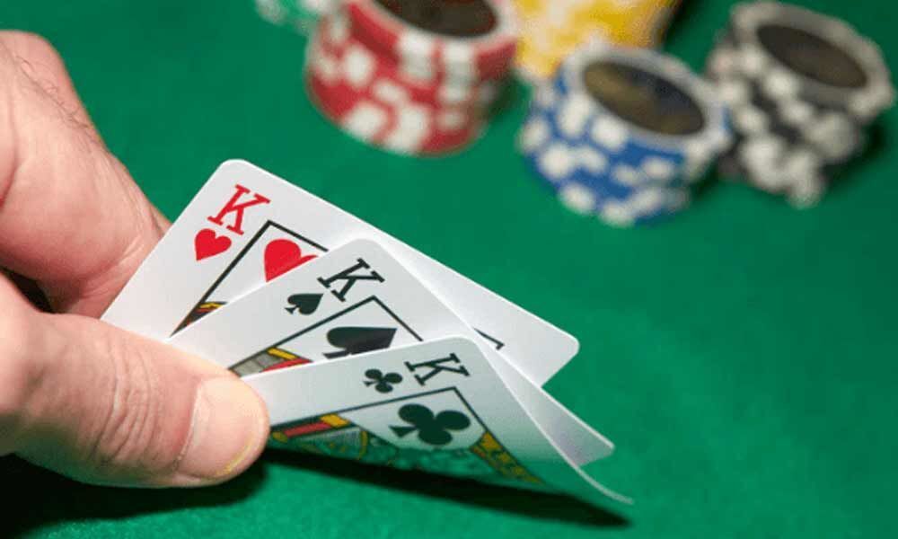 Seven held for playing three card poker