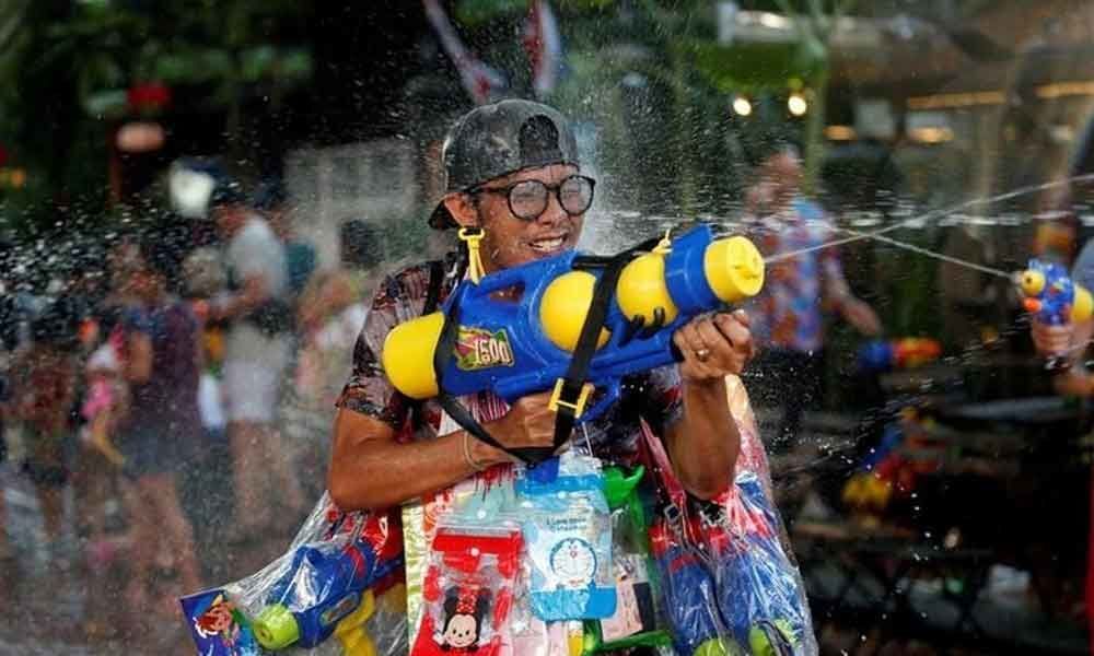 Worlds biggest water fight cancelled for Thai kings coronation