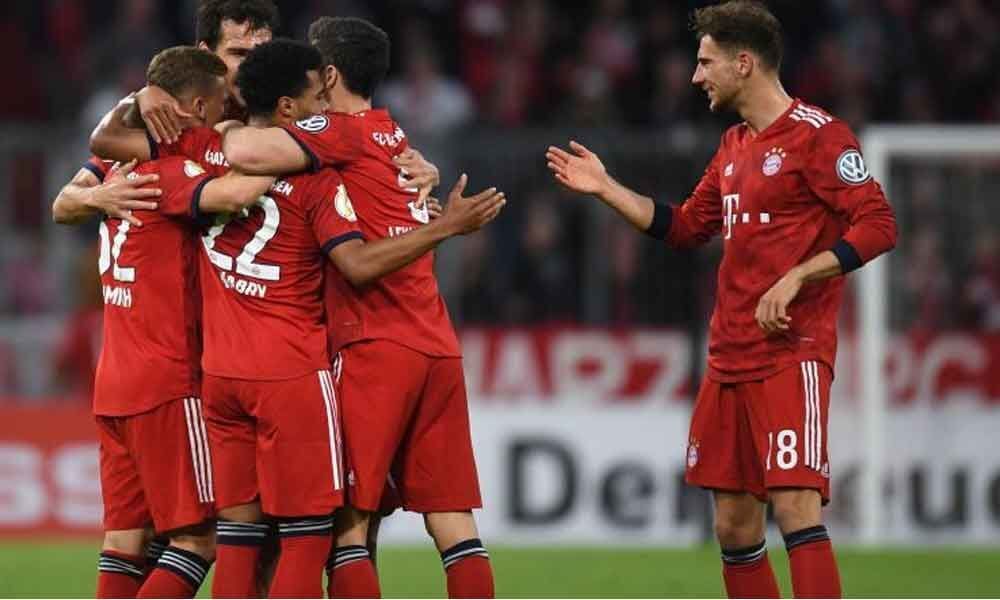 German Cup: Lewandowski strikes twice as 10 man Bayern races to the semis