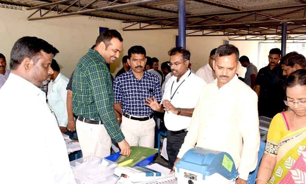 Collector, poll observer inspect strongrooms