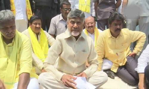 CM Chandrababu Naidu stages protest against IT raids on TDP leaders
