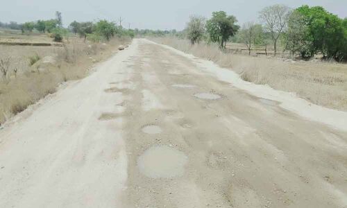 Commuters fume over damaged road