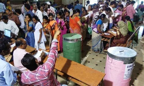 Poll staff queue up to cast postal ballot