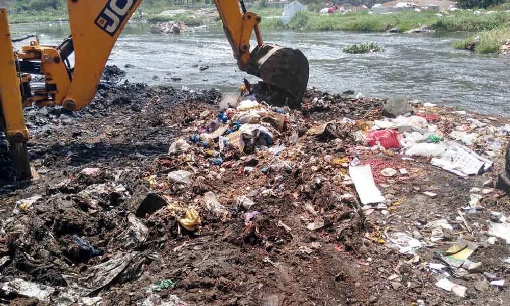 Musi River Front Development Corporation Limited begins clearing of garbage at Musi