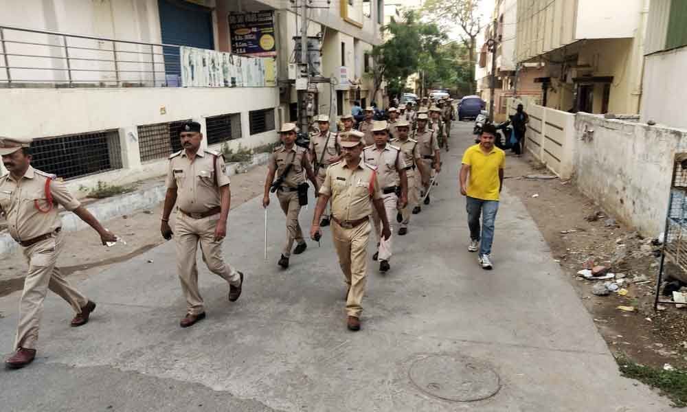 Police, Railway Protection Special Force conduct flag march