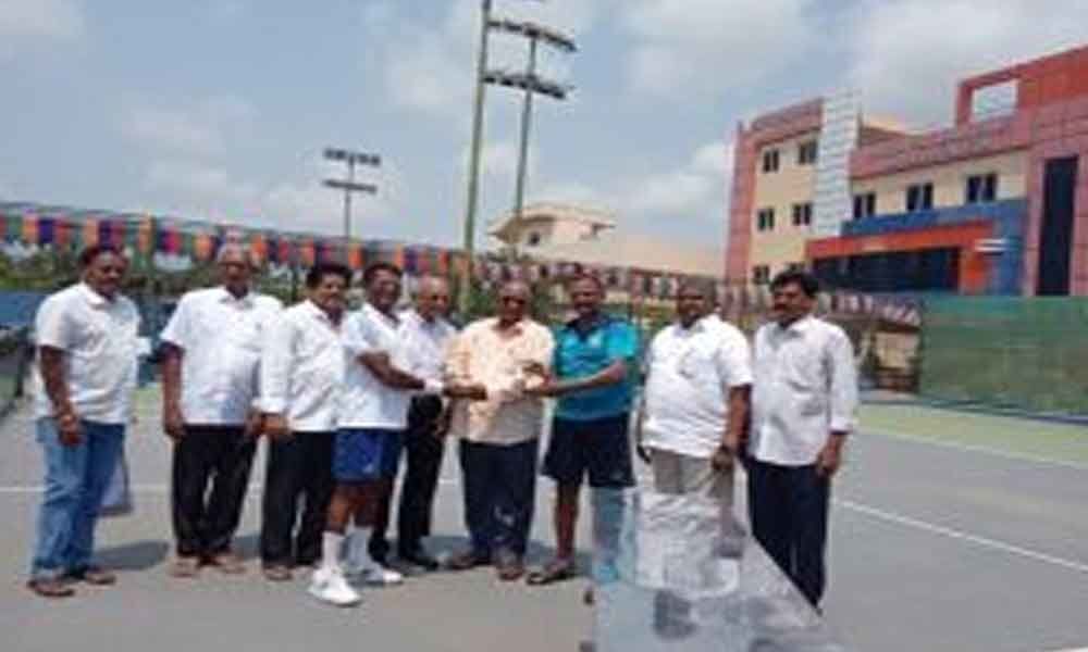 Radha, Raju win tennis doubles trophy