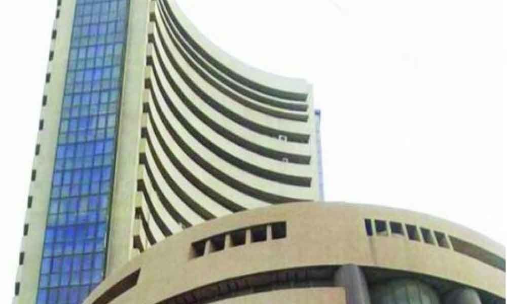 Sensex, Nifty end lower after IMF cuts global growth estimate